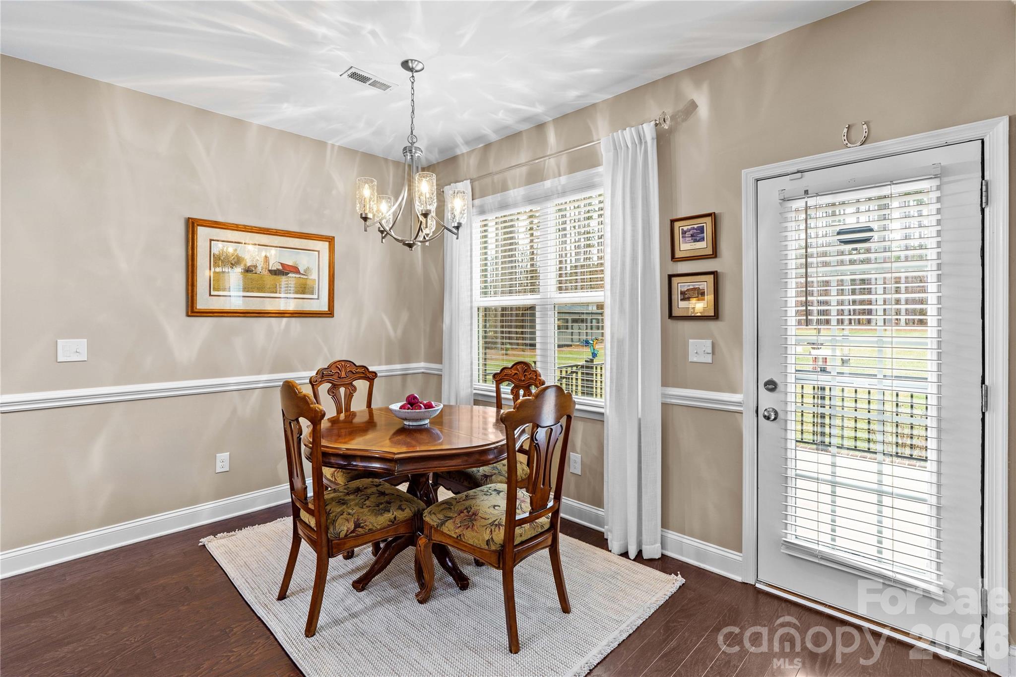 106 Dayvault Cut Road Troutman, NC 28166 - Photo 16 of 48 a dining room with furniture and window