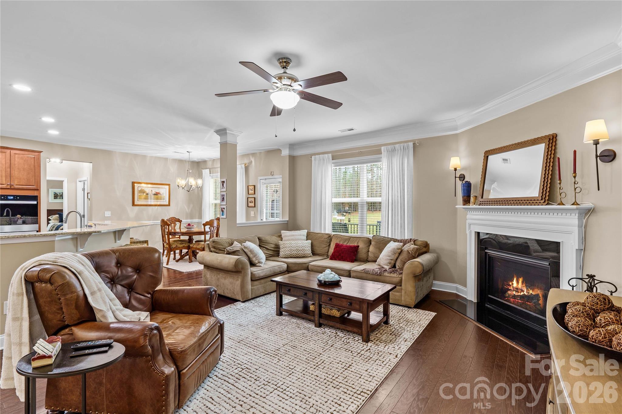 106 Dayvault Cut Road Troutman, NC 28166 - Photo 20 of 48 a living room with furniture fireplace and a window