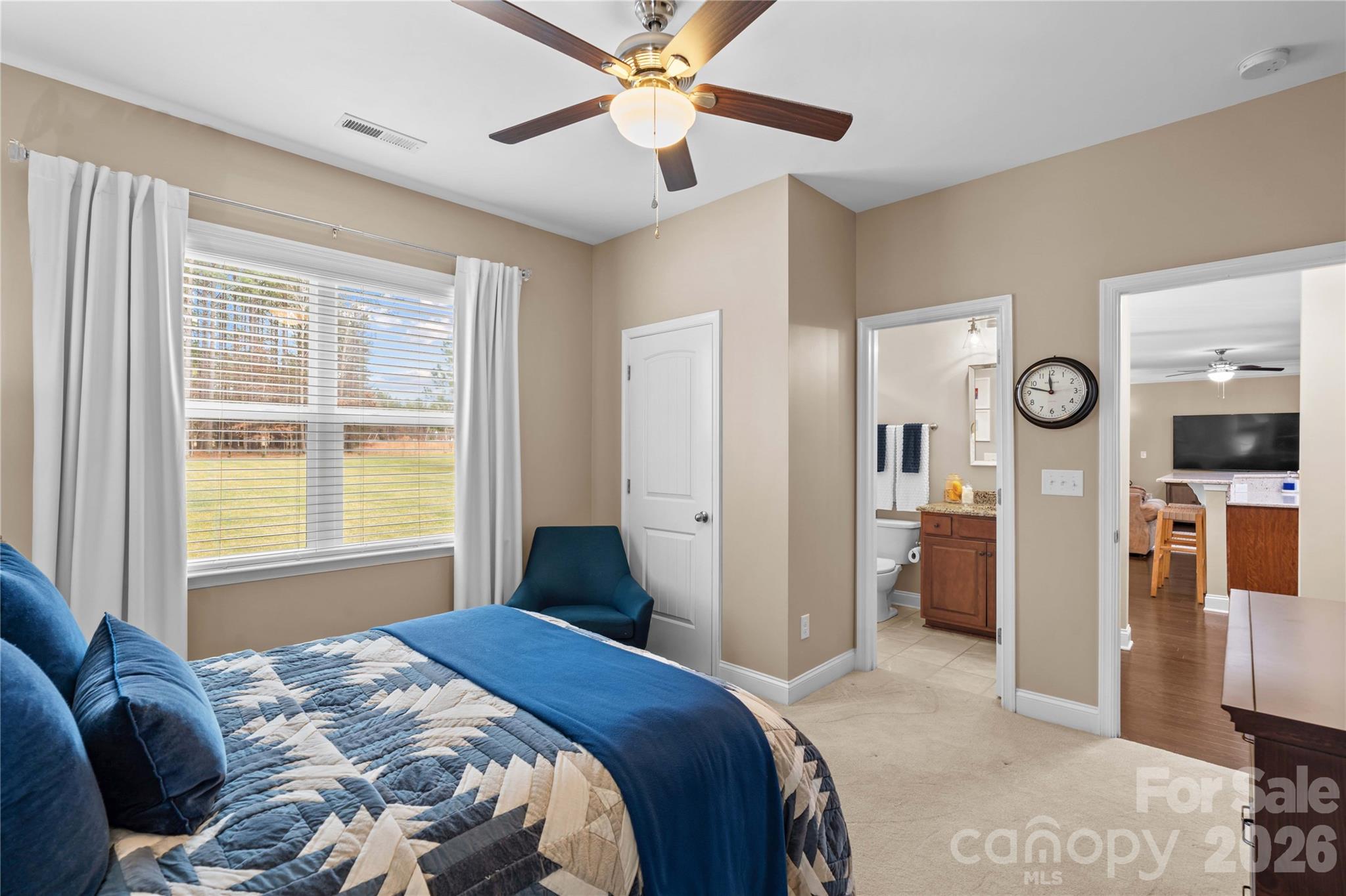 106 Dayvault Cut Road Troutman, NC 28166 - Photo 24 of 48 a bedroom with a bed and a window