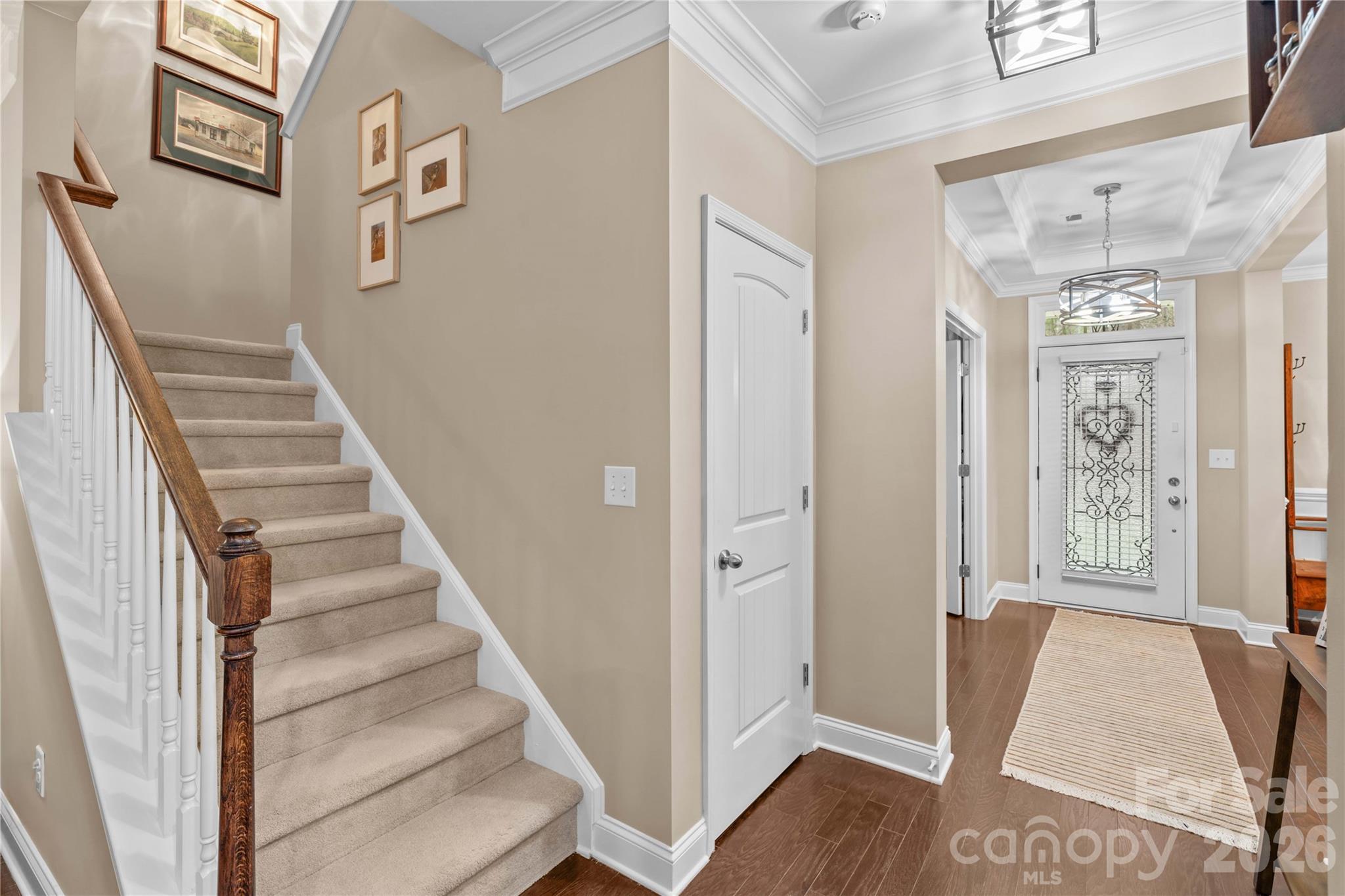 106 Dayvault Cut Road Troutman, NC 28166 - Photo 25 of 48 a view of entryway with furniture and wooden floor