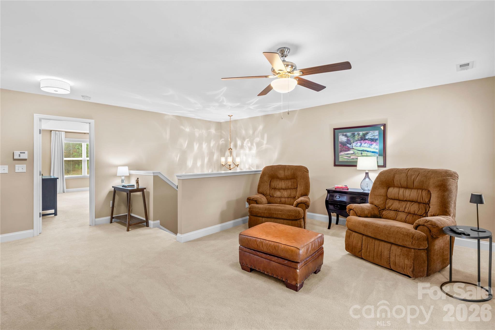 106 Dayvault Cut Road Troutman, NC 28166 - Photo 27 of 48 a living room with furniture and a window