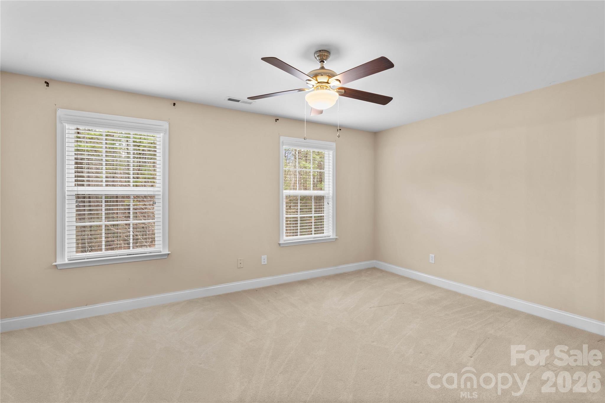 106 Dayvault Cut Road Troutman, NC 28166 - Photo 35 of 48 a view of an empty room with a window