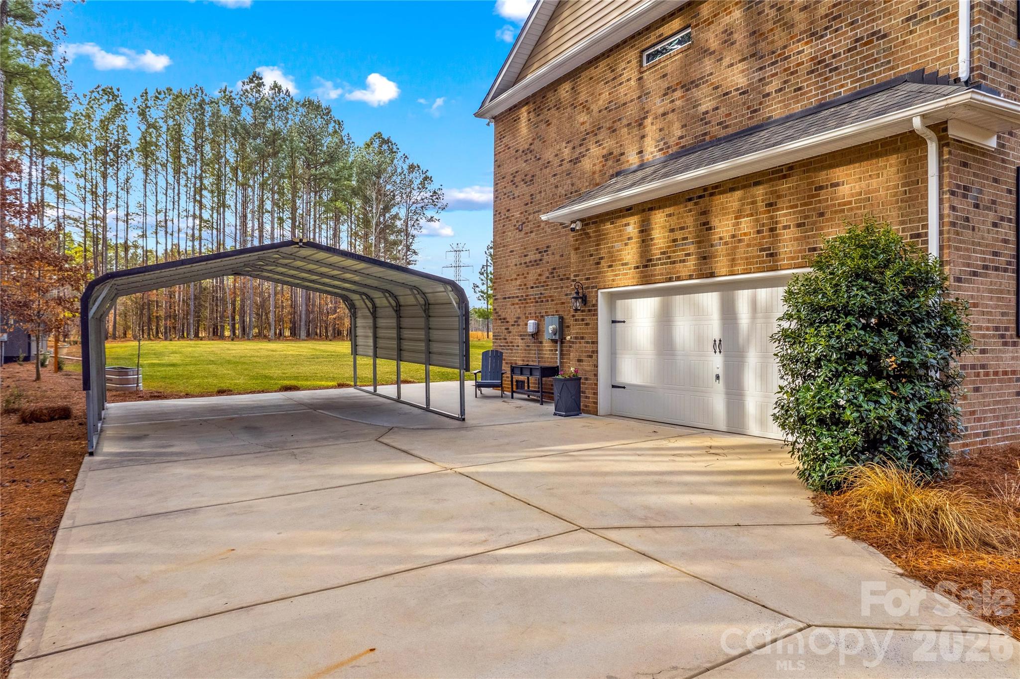 106 Dayvault Cut Road Troutman, NC 28166 - Photo 39 of 48 a view of backyard with swimming pool and fire pit