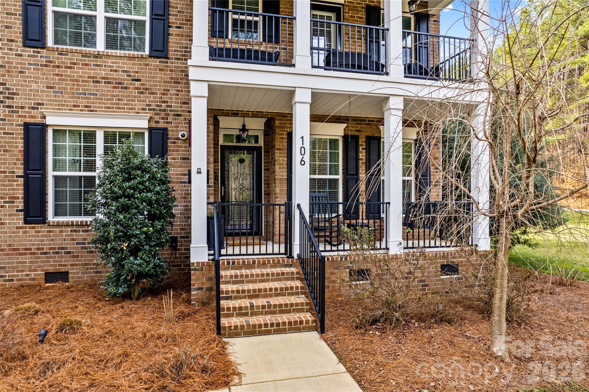 106 Dayvault Cut Road Troutman, NC 28166 - Photo 4 of 48 front view of a brick house with a large windows