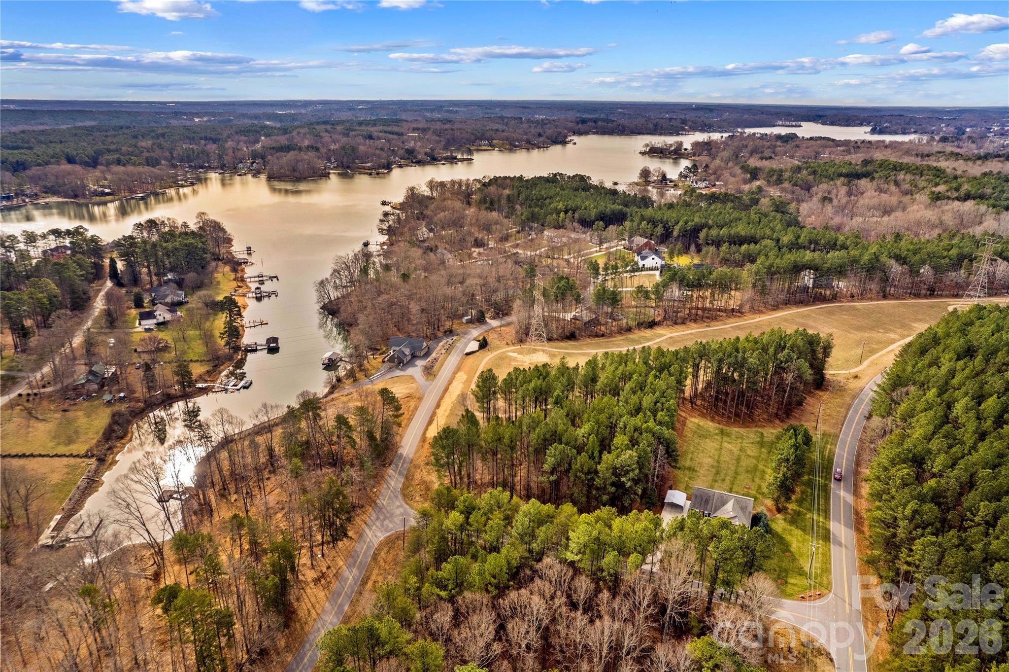 106 Dayvault Cut Road Troutman, NC 28166 - Photo 44 of 48 a view of a lake with a city