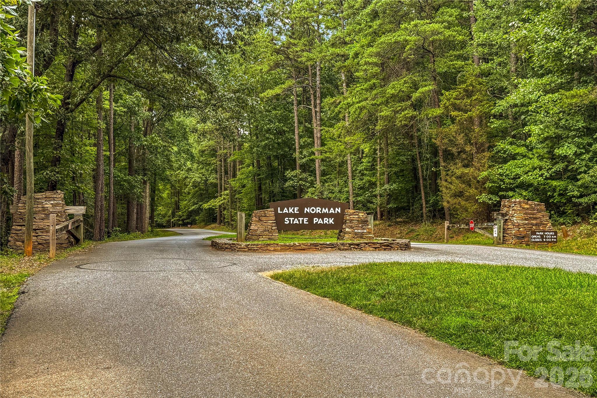 106 Dayvault Cut Road Troutman, NC 28166 - Photo 45 of 48 a childrens park with lots of trees and plants