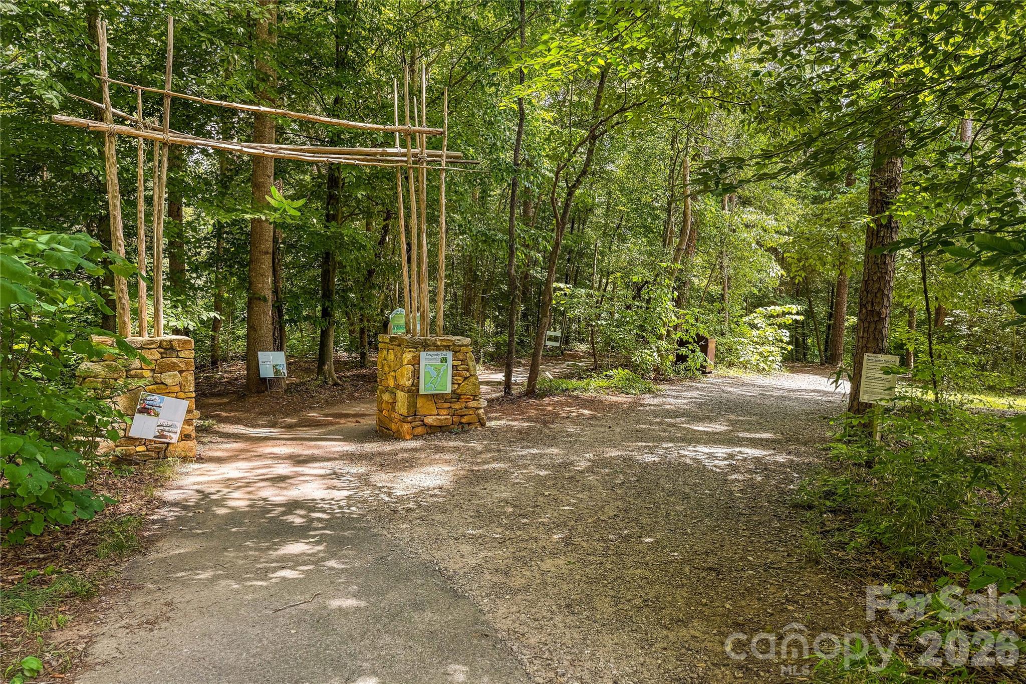 106 Dayvault Cut Road Troutman, NC 28166 - Photo 47 of 48 a view of a field with trees in the background