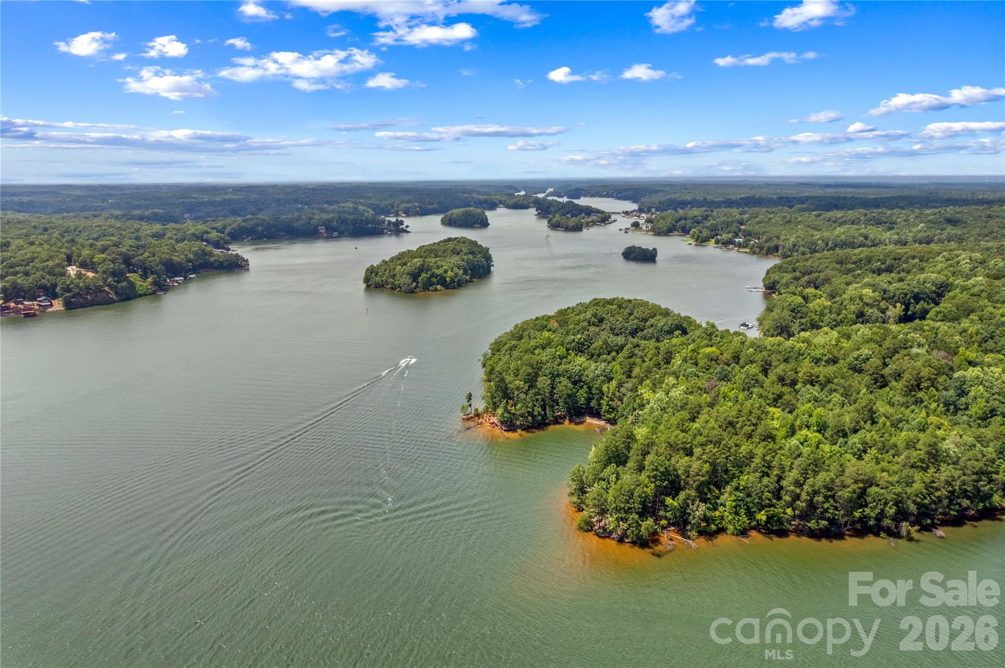 106 Dayvault Cut Road Troutman, NC 28166 - Photo 48 of 48 a view of a lake with a yard