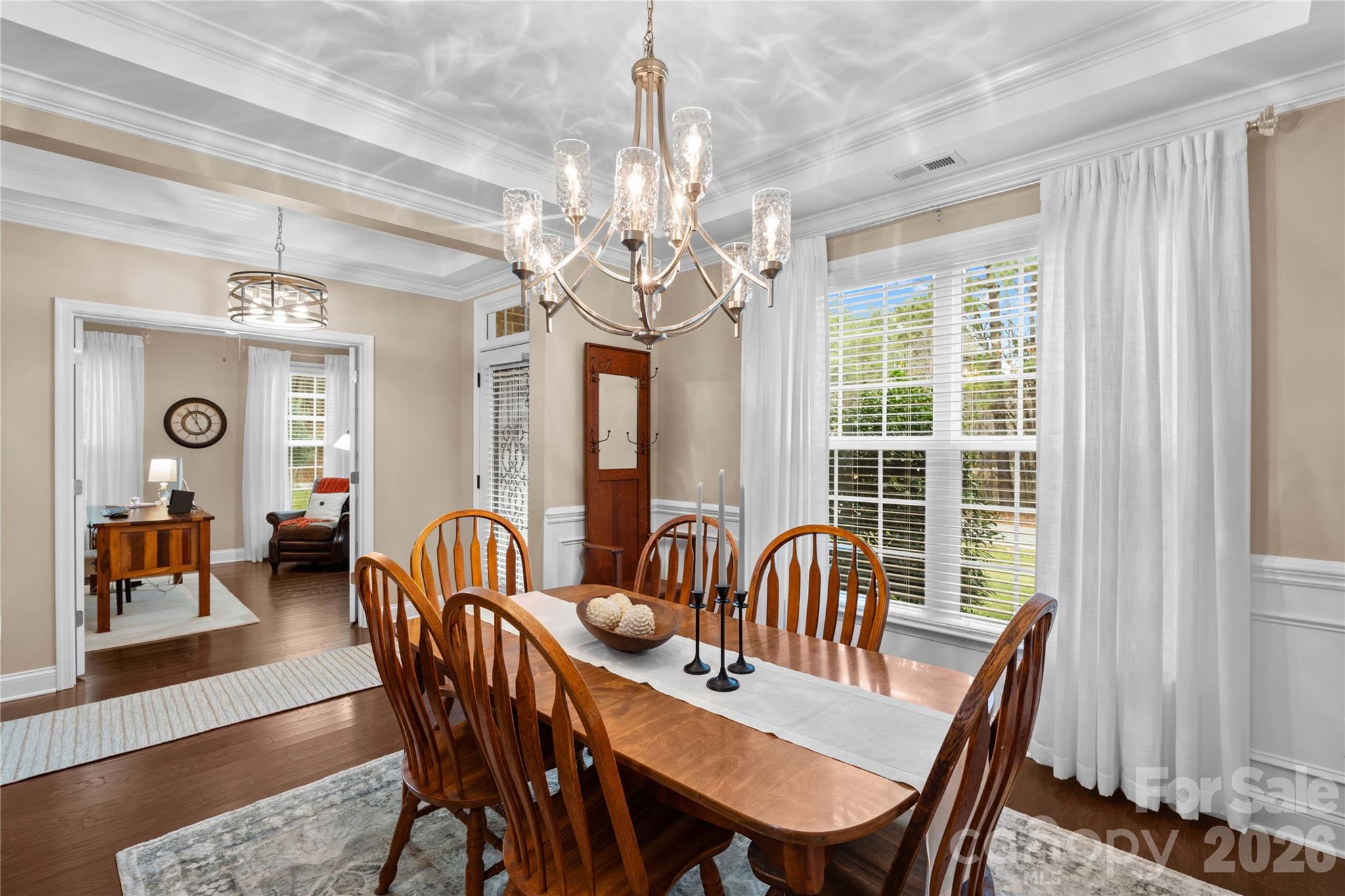 106 Dayvault Cut Road Troutman, NC 28166 - Photo 5 of 48 a view of a a dining room with furniture window and wooden floor