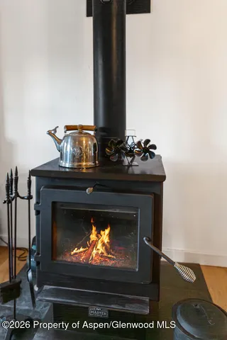 a stove top oven sitting inside of a kitchen