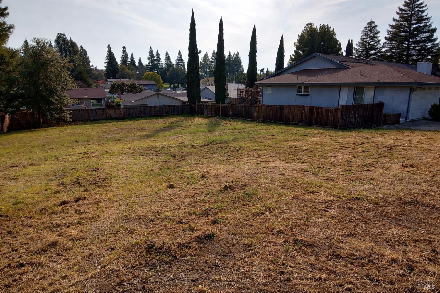 445 Lakehurst Court Fairfield, CA 94533 - Photo 5 of 40 a view of a house with a yard and sitting area