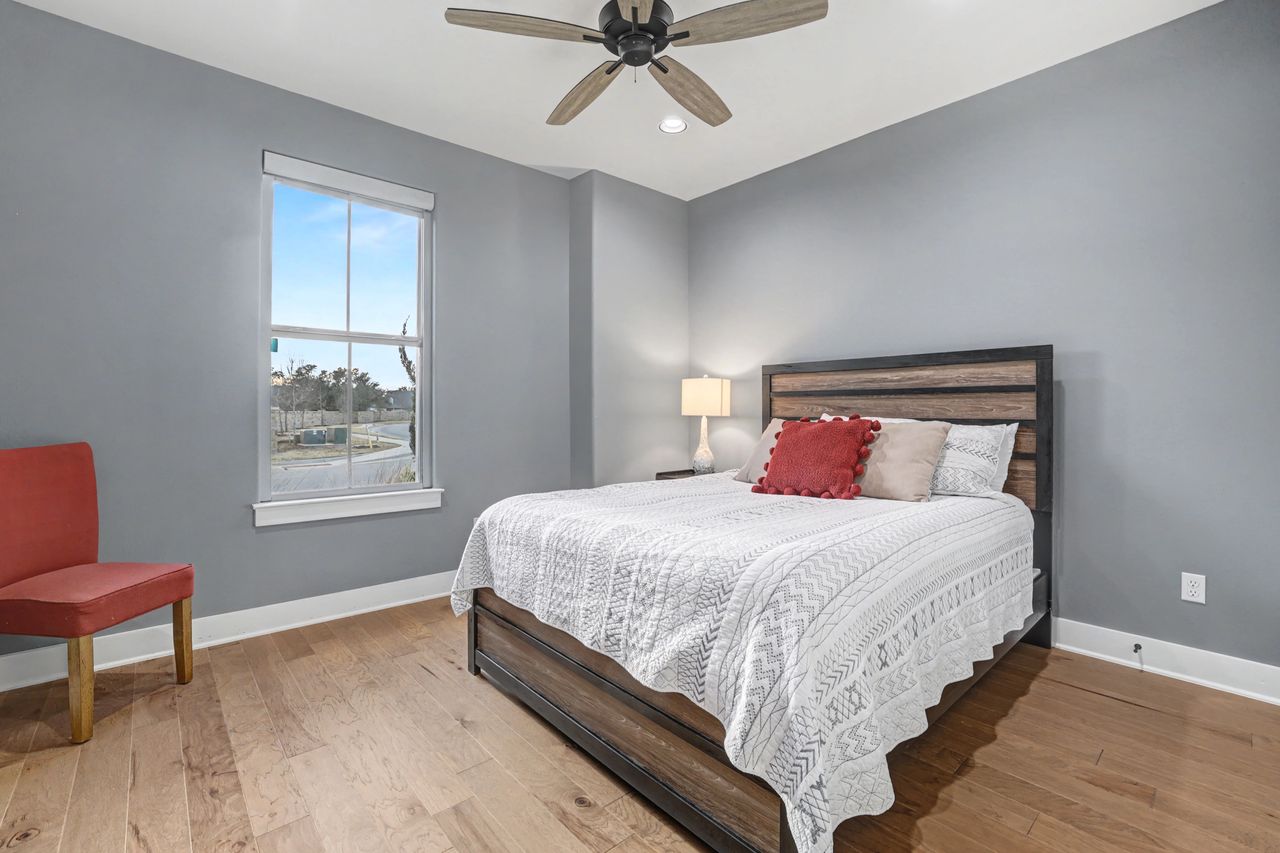 2408 Nate's Place Georgetown, TX 78633 - Photo 25 of 40 Bedroom with light wood finished floors, ceiling fan, and recessed lighting