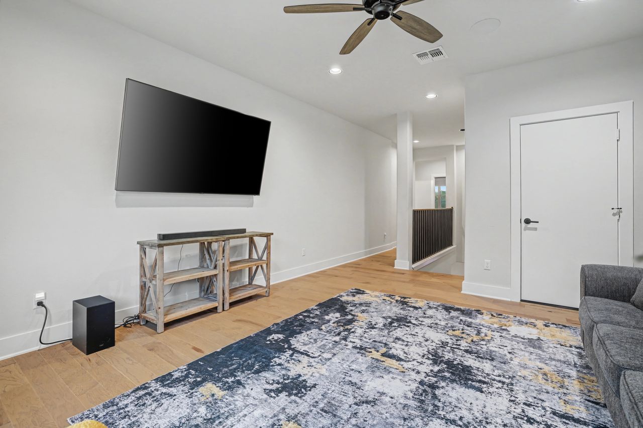 2408 Nate's Place Georgetown, TX 78633 - Photo 27 of 40 Living room featuring light wood finished floors, ceiling fan, and recessed lighting