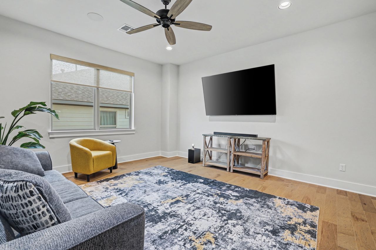 2408 Nate's Place Georgetown, TX 78633 - Photo 28 of 40 Living room featuring light wood finished floors, ceiling fan, and recessed lighting