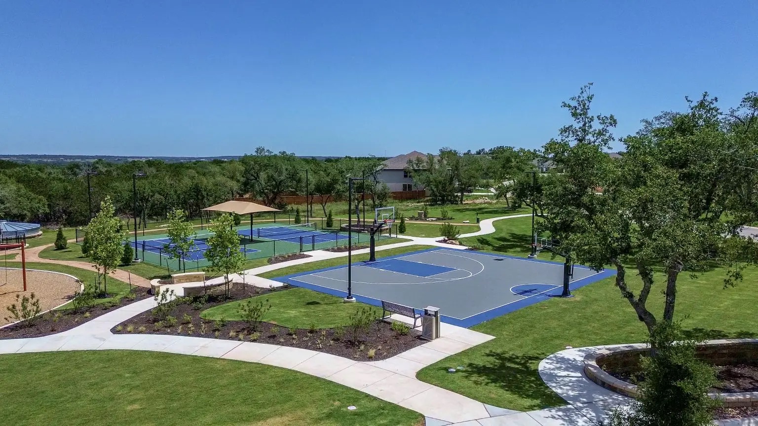 2408 Nate's Place Georgetown, TX 78633 - Photo 39 of 40 View of basketball court featuring a yard and community basketball court