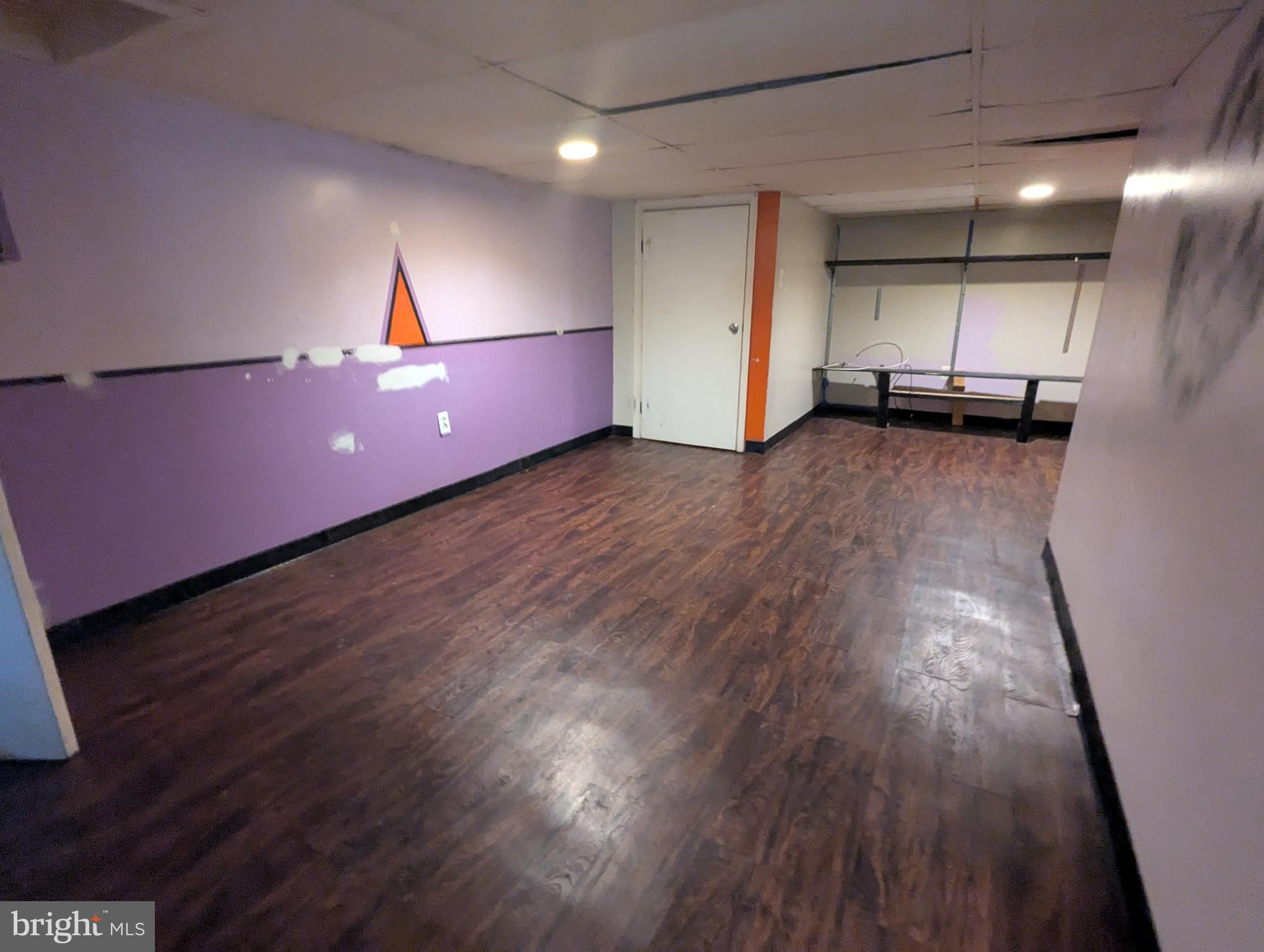 4133 Eierman Avenue Baltimore, MD 21206 - Photo 17 of 23 a view of a livingroom with wooden floor