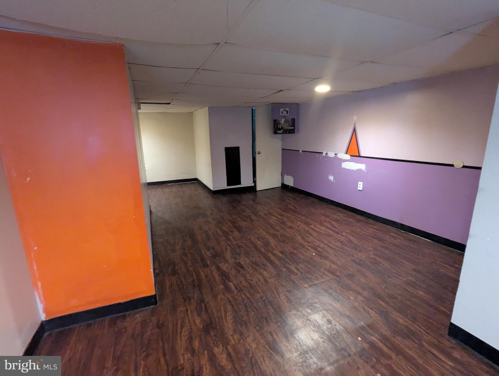 4133 Eierman Avenue Baltimore, MD 21206 - Photo 19 of 23 a view of empty room with wooden floor