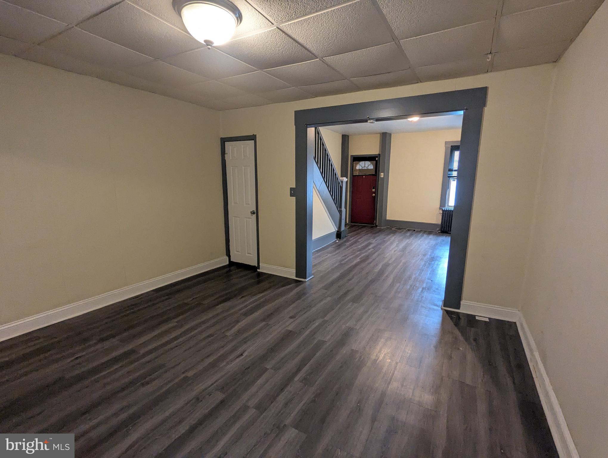 4133 Eierman Avenue Baltimore, MD 21206 - Photo 7 of 23 a view of empty room with wooden floor