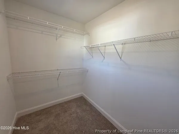 a view of empty room with windows