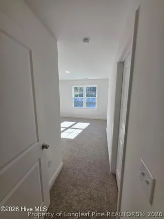 a view of a sink and a mirror of cabinet