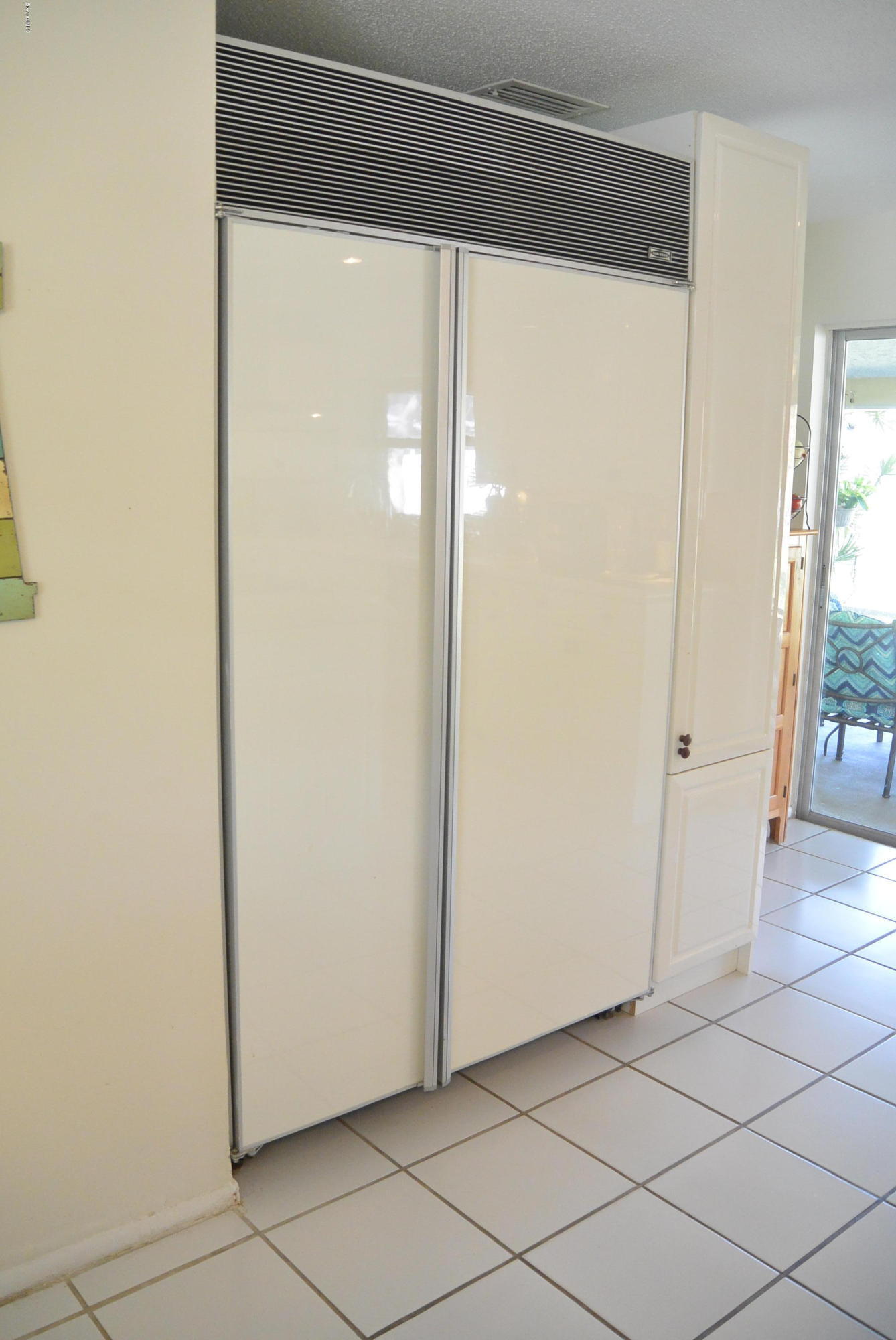 9 West Point Drive Cocoa Beach, FL 32931 - Photo 11 of 28 a view of a room with wooden floor