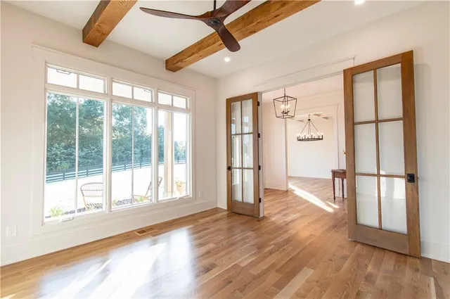 a kitchen with a sink and a potted plant