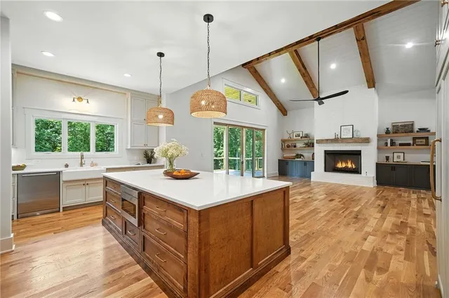 a white bath tub sitting next to a white toilet