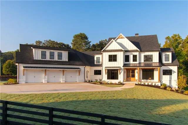 a front view of a house with swimming pool