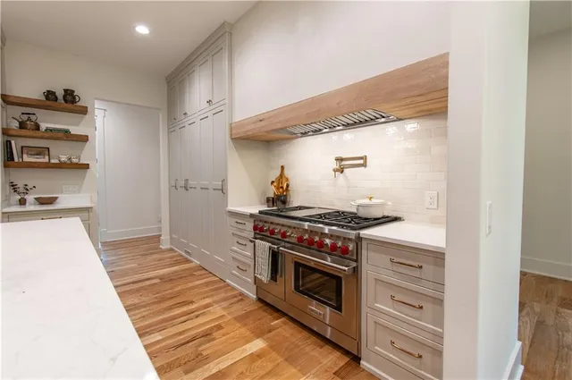 a bathroom with a sink a toilet and a bathtub