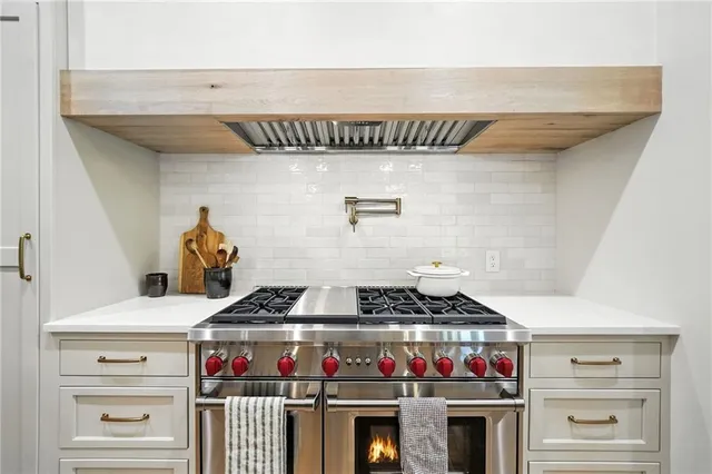 a view of a room with a staircase and a rug