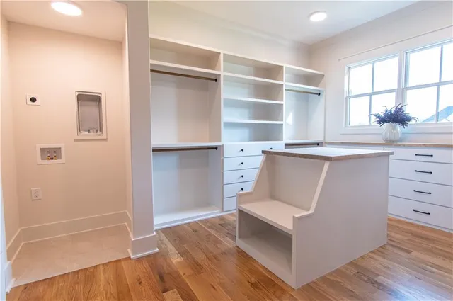 a bathroom with a double vanity sink and mirror