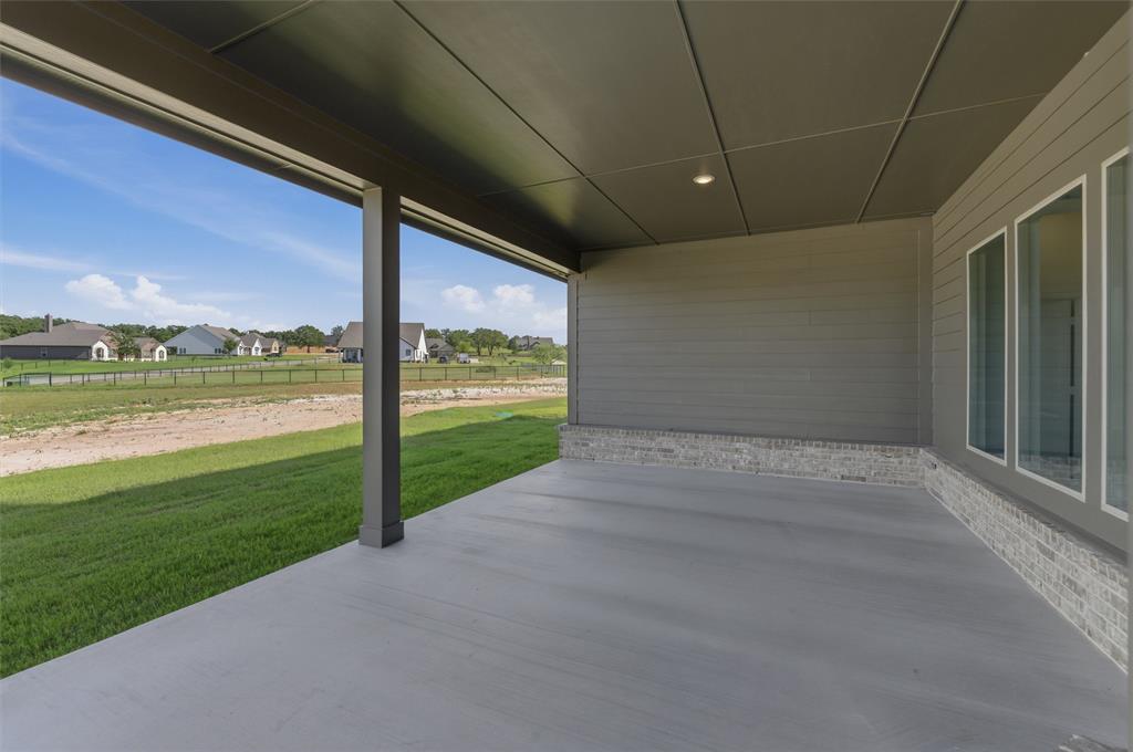 605 Tay Tay Way Springtown, TX 76082 - Photo 25 of 31 Expansive covered patio featuring a concrete surface and recessed lighting