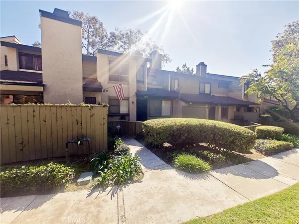 a view of a house with a garden