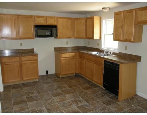 217 Brickyard Road Athol, MA 01331 - Photo 3 of 14 a kitchen with stainless steel appliances granite countertop a sink stove and microwave