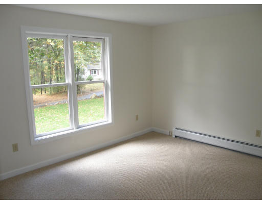 217 Brickyard Road Athol, MA 01331 - Photo 5 of 14 an empty room with a window