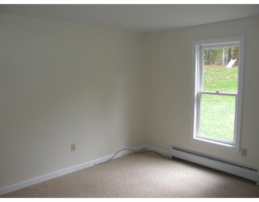 217 Brickyard Road Athol, MA 01331 - Photo 6 of 14 an empty room with a window