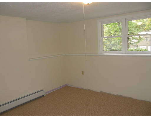 217 Brickyard Road Athol, MA 01331 - Photo 7 of 14 an empty room with a window