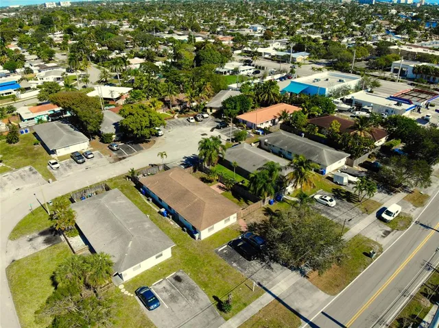 a view of a house with a yard and garage