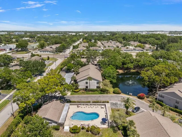 an aerial view of a house with a garden
