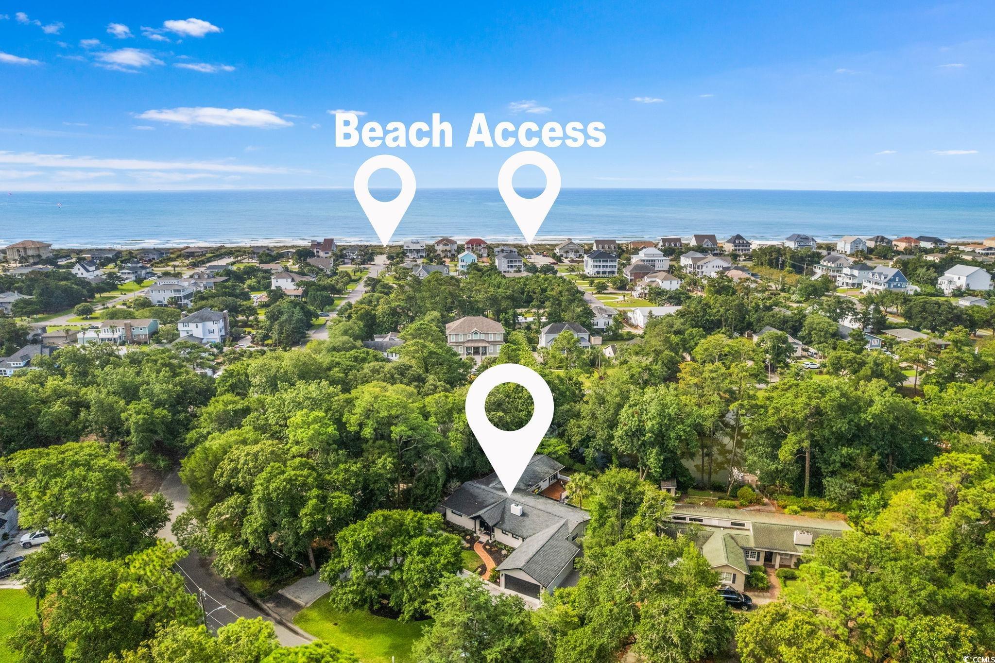 1202 Prince William Road North Myrtle Beach, SC 29582 - Photo 1 of 40 Drone / aerial view featuring a water view