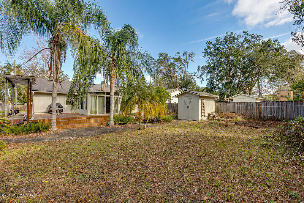 1866 Clemson Road Jacksonville, FL 32217 - Photo 19 of 21 a view of a yard with a house