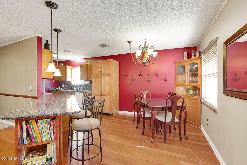1866 Clemson Road Jacksonville, FL 32217 - Photo 7 of 21 a dining room with furniture and window