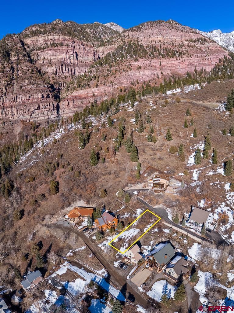 Tbd 6th Street Ouray, CO 81427 - Photo 13 of 19 a view of a city with mountains in the background
