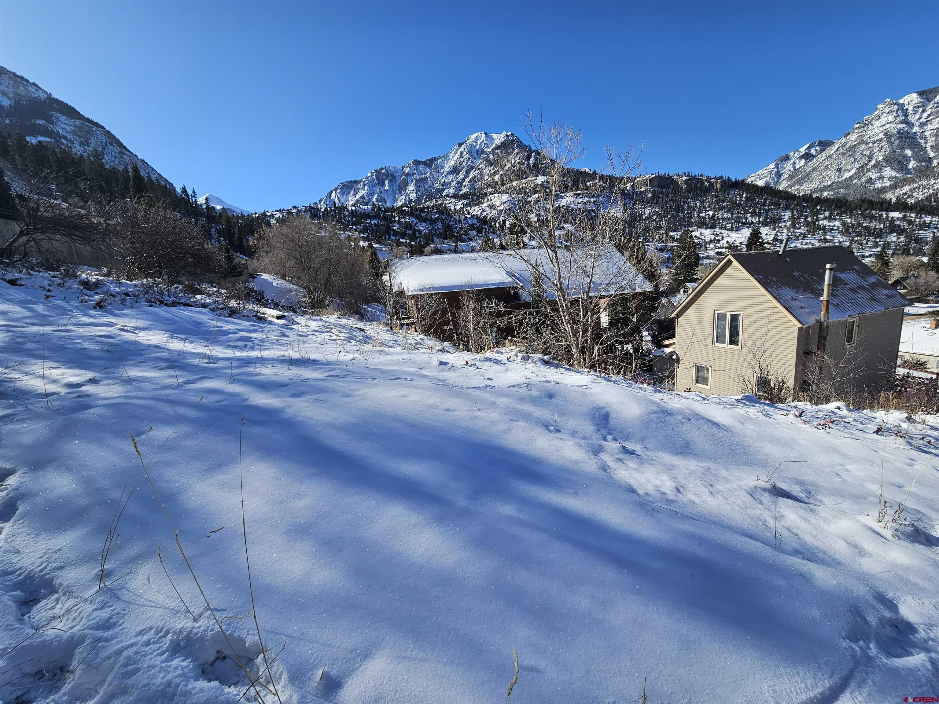 Tbd 6th Street Ouray, CO 81427 - Photo 3 of 19 a view of a house with a snow in the background