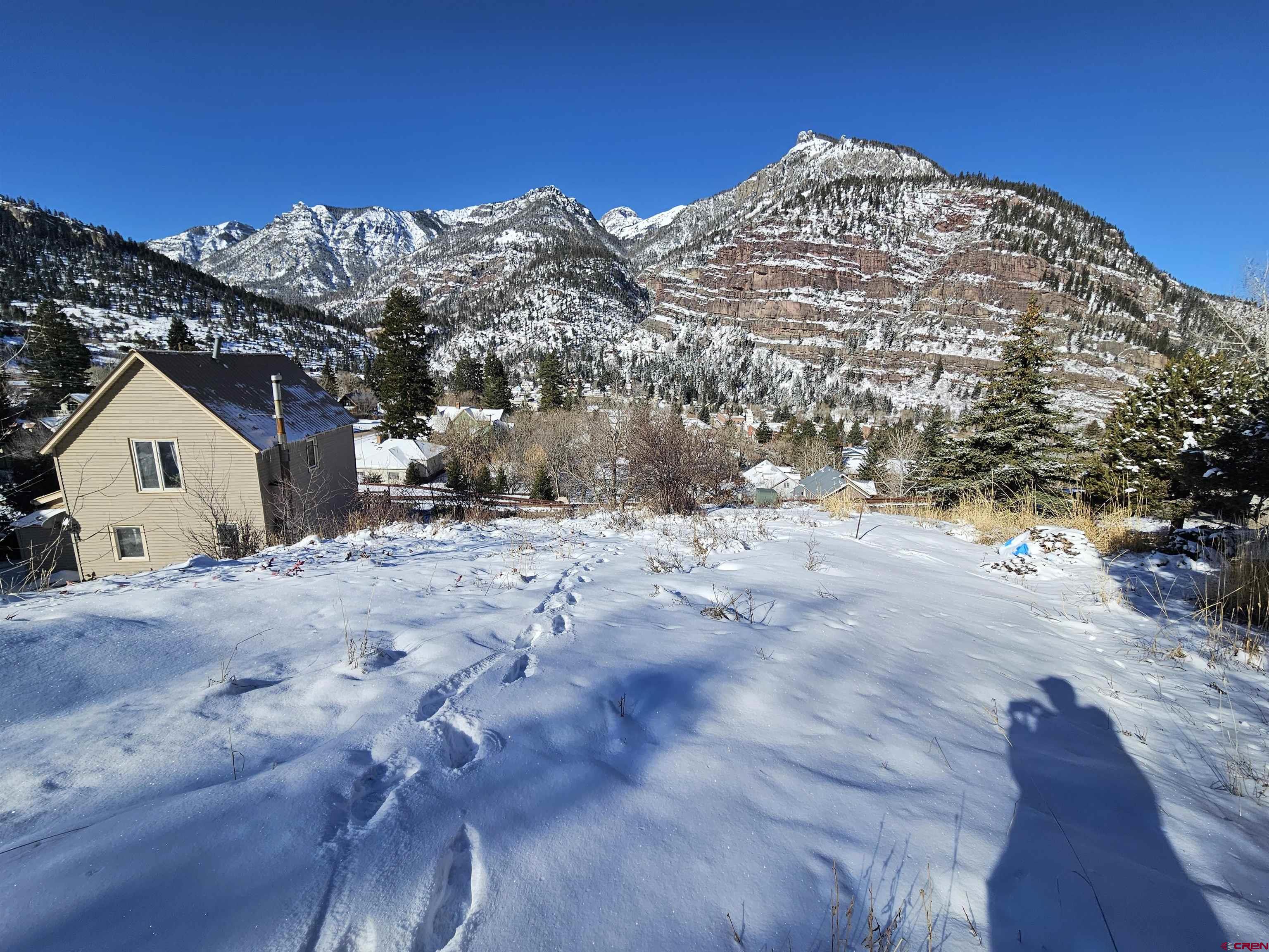 Tbd 6th Street Ouray, CO 81427 - Photo 5 of 19 a view of a house with a snow in the background