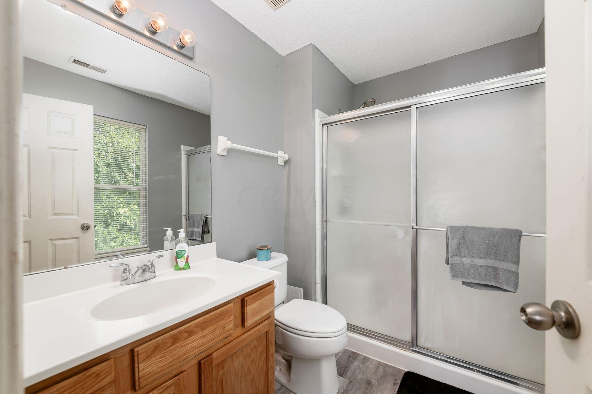 626 Herman Road, Unit 2904 Columbus, OH 43230 - Photo 15 of 25 Full bath with walk-in shower and extra wide vanity.