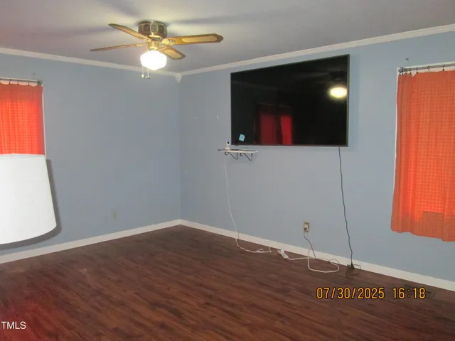 a view of a livingroom with a window