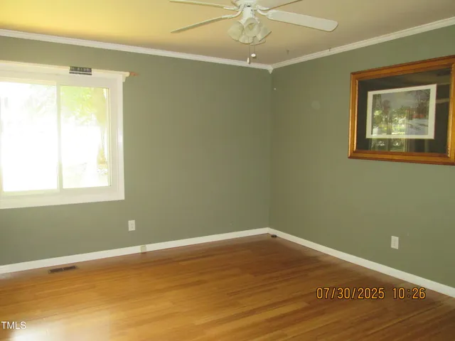 a bathroom with a toilet and a bathtub
