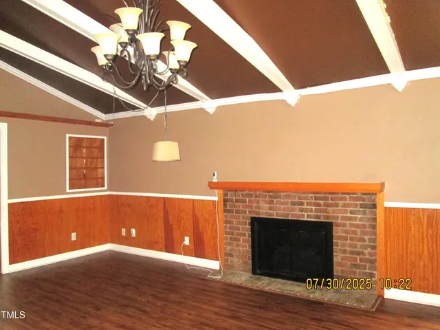 a view of a livingroom with a fireplace