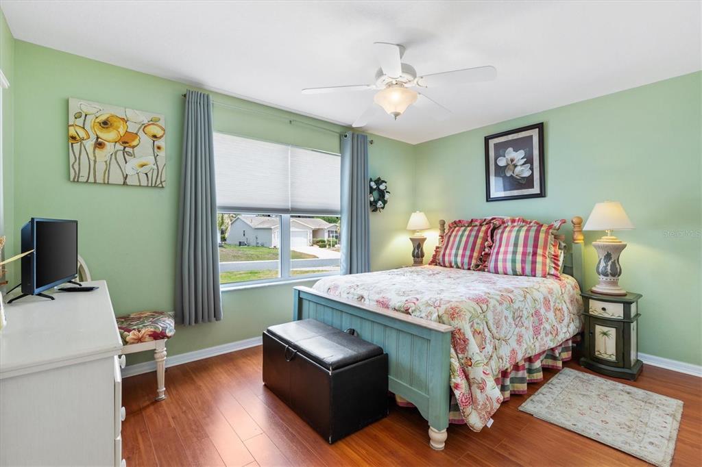 470 Oboe Way The Villages, FL 32162 - Photo 16 of 42 a bedroom with a bed and a window